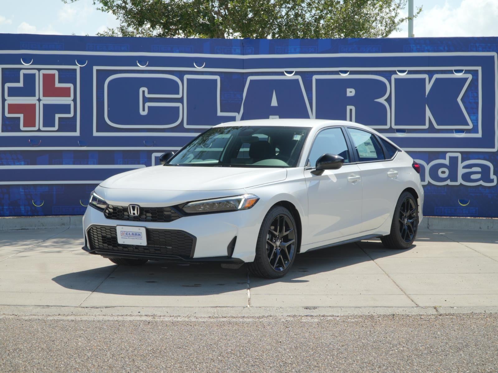 2026 Honda Civic Sport in Platinum White Pearl — front three-quarter view