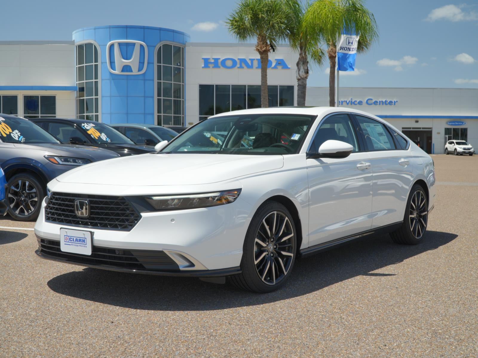 2026 Honda Accord Touring in Platinum White Pearl — front three-quarter view