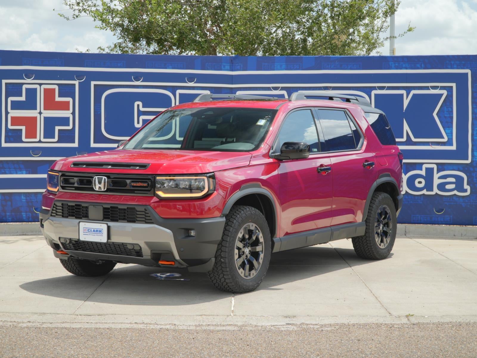 2026 Honda Passport TrailSport Elite in Radiant Red Metallic II — front three-quarter view