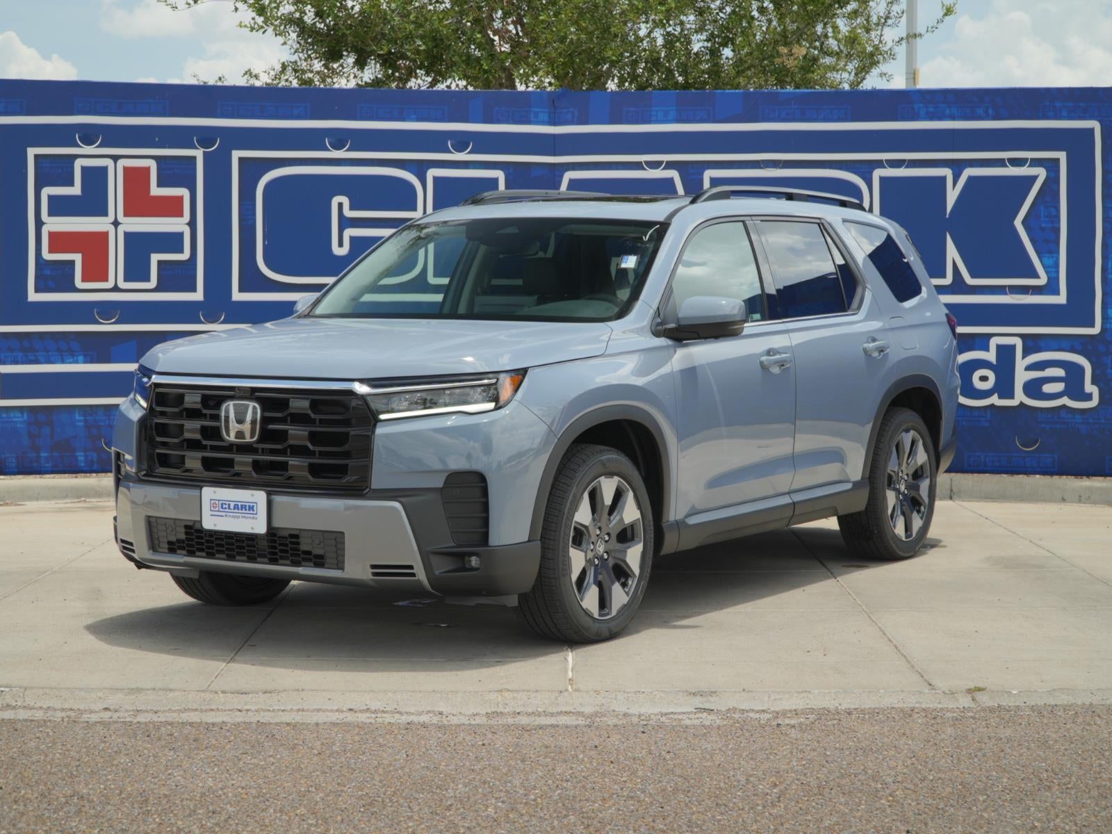 2026 Honda Pilot Touring in Sonic Gray Pearl — front three-quarter view