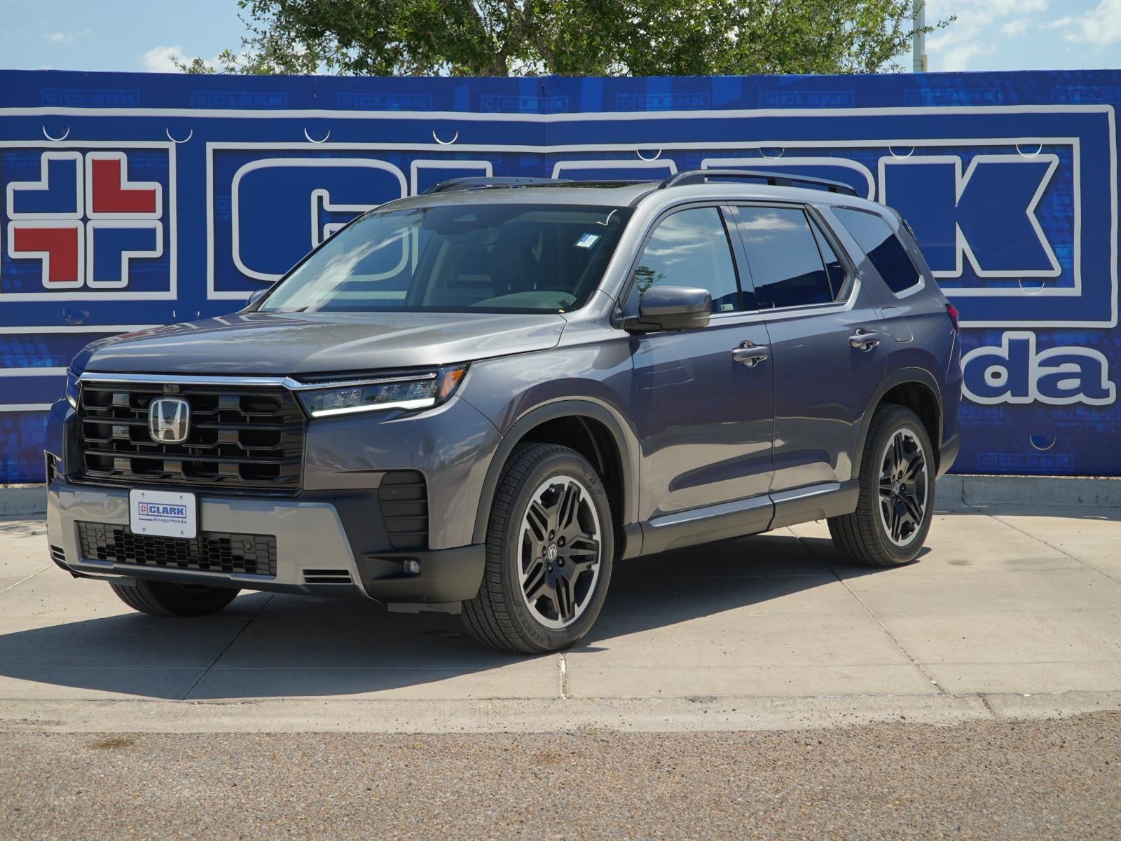 2026 Honda Pilot Touring S in Modern Steel Metallic — front three-quarter view