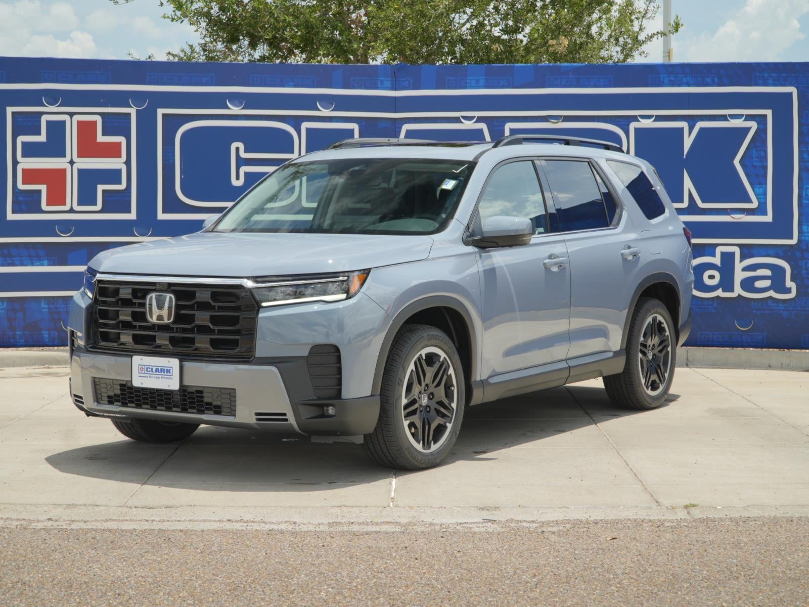 2026 Honda Pilot Touring Blackout in Sonic Gray Pearl — front three-quarter view