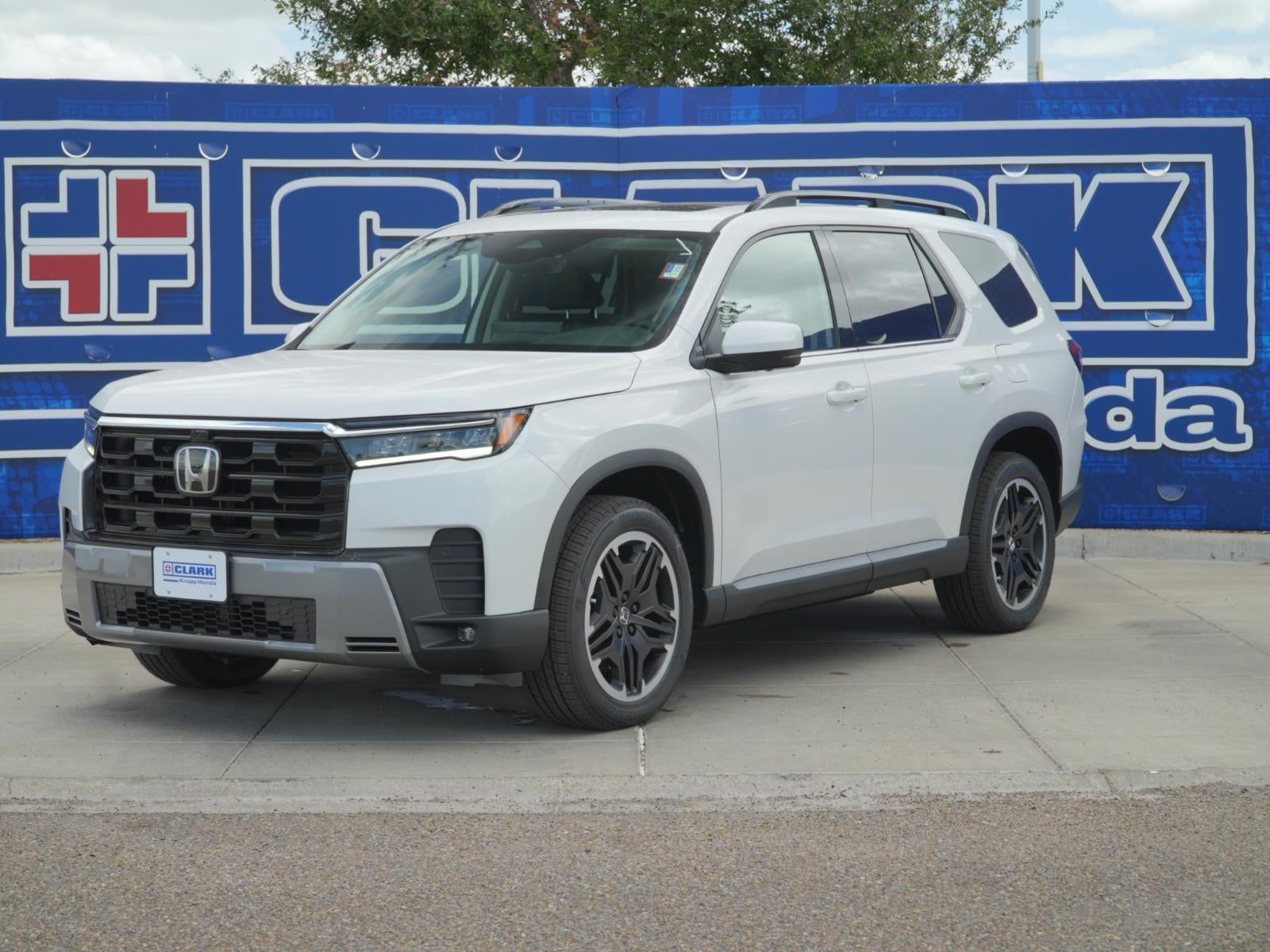 2026 Honda Pilot Touring S in Platinum White Pearl — front three-quarter view