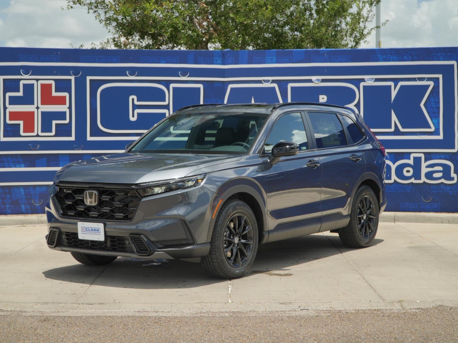 2026 Honda CR-V Hybrid Sport-L in Meteorite Gray Metallic — front three-quarter view