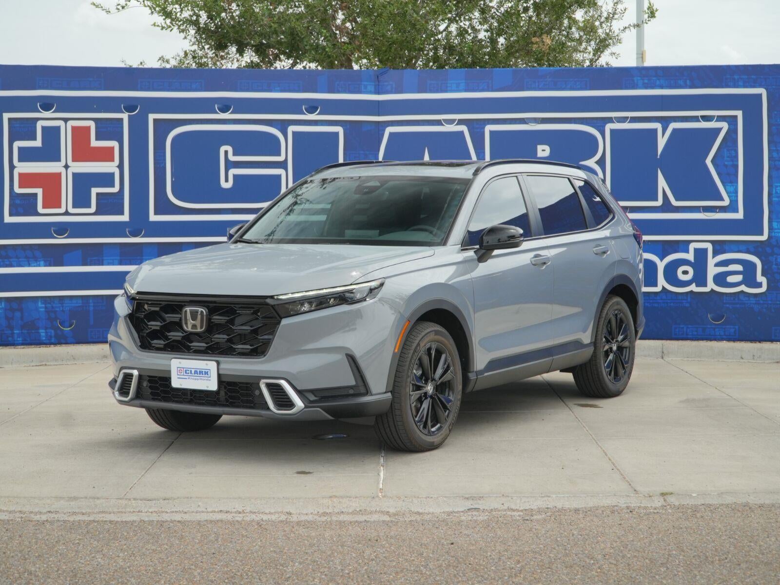 2026 Honda CR-V Hybrid Sport Touring in Urban Gray Pearl — front three-quarter view